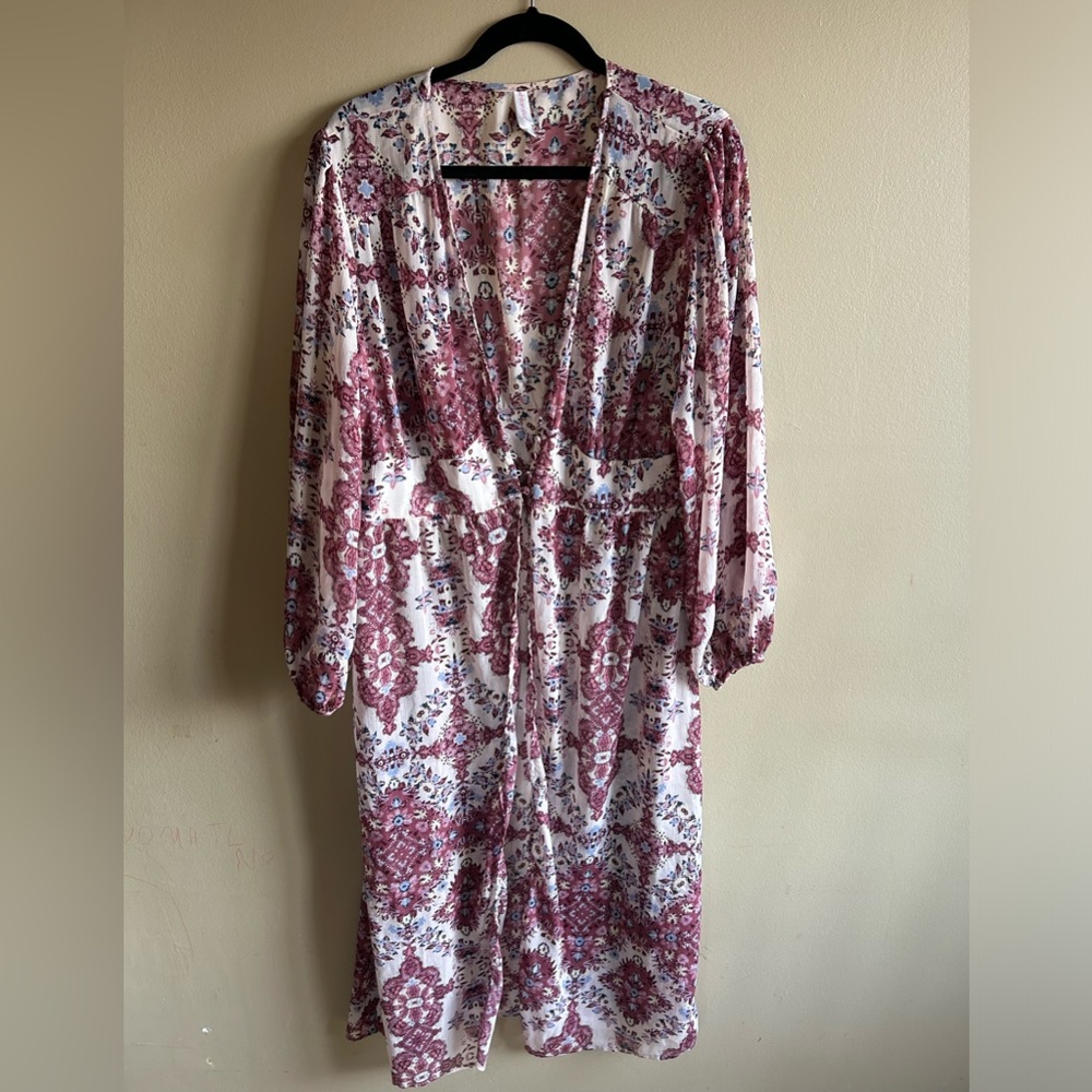 Maxi length kimono with buttons.
